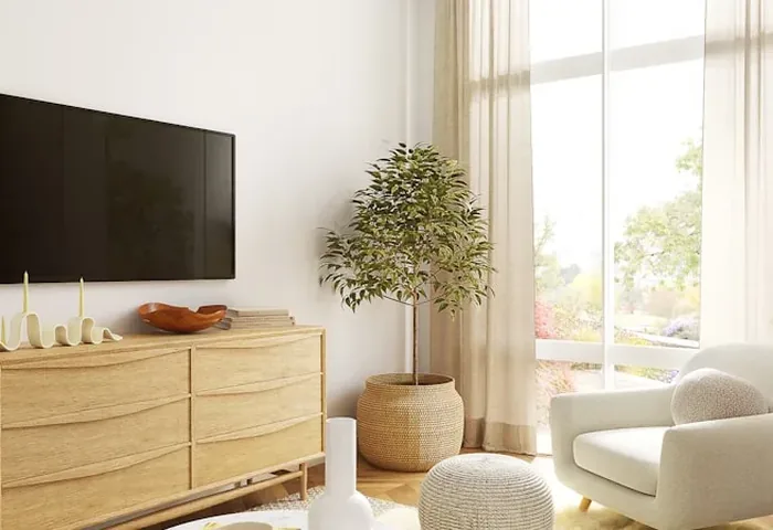 Living room with a large wall-mounted Smart TV, representing a home setup for watching movies and series
